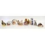 Royal Crown Derby paperweights to include an upright squirrel h10cm, another squirrel,