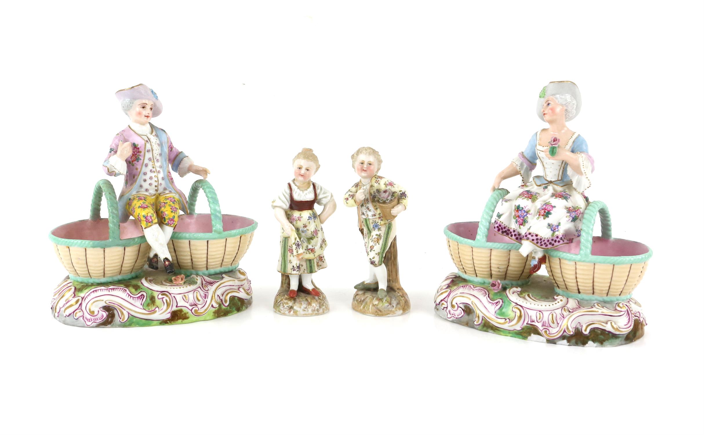 Pair of Volkstedt figures, boy with a flower pot and a girl holding up her apron, 10.