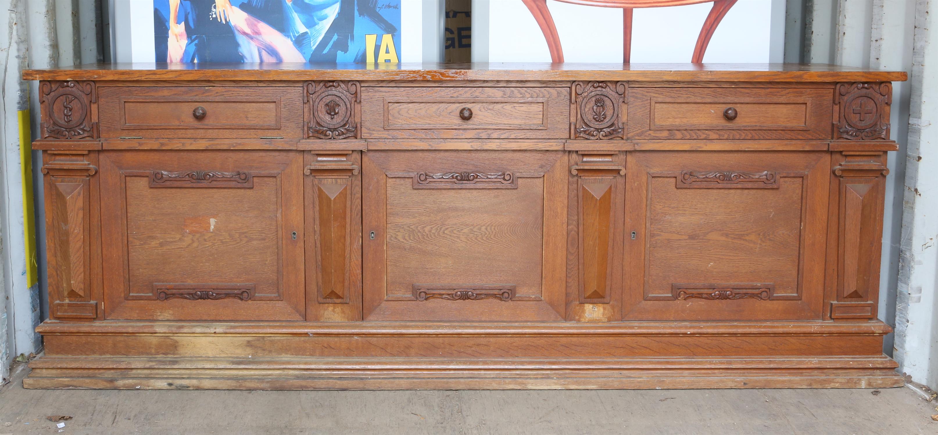 Late 19th century oak sideboard, with three drawers above cupboards on plinth base, H82 x W220.