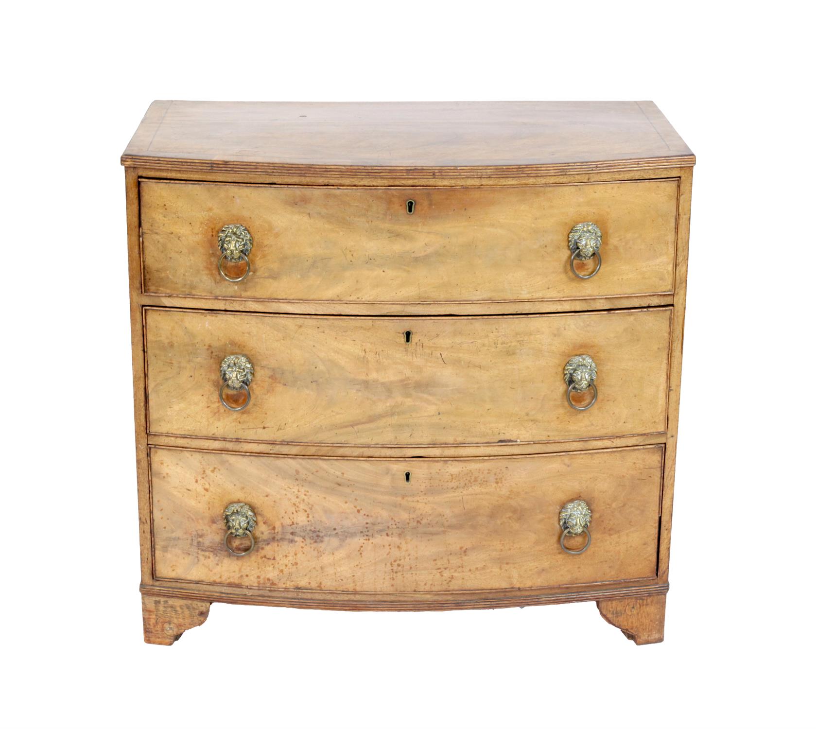 19th century mahogany bowfronted chest of three long graduating drawers on bracket feet,