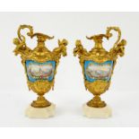 Pair of late 19th century Sevres style jewelled porcelain and gilt metal ewer vases,