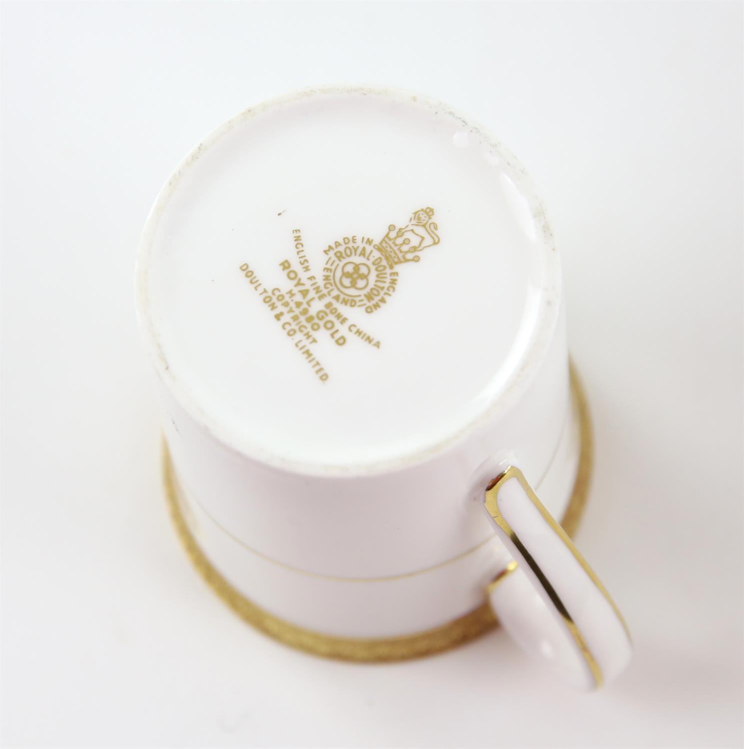 Royal Doulton 'Royal Gold' dinner service, decorated with a gilt border and band on a white ground, - Image 2 of 2