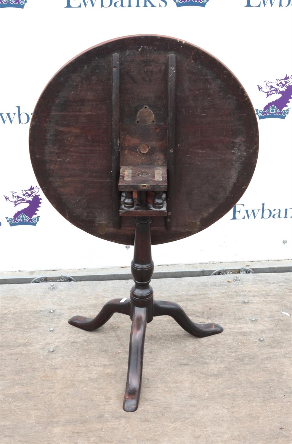 19th century mahogany tilt top table, on turned column and tripod base, H64cm Diameter 68.5cm - Image 2 of 2