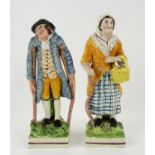 Staffordshire porcelain pair of figures, a man on crutches and woman with a walking stick, h21cm