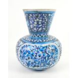 Late 19th or early 20th century Multan, India vase, decorated in shades of blue with floral motifs,