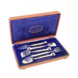 AMENDED DESCRIPTION Christofle silver gateau set in the form of five gardening spades and forks