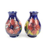 Moorcroft Anemone pattern vase of baluster form, with pink and purple tube line decorated flowers