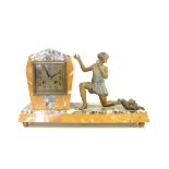 Art Deco clock inscribed Bonis Douarnenez, with figure of a girl kneeling, watching a cat playing,