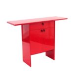 Contemporary red lacquer cabinet, with rectangular top over a single drawer and two cupboard doors