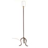 Arts and Crafts wrought iron standard lamp on tripod base, H145cm