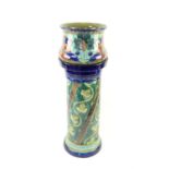 Burmantofts jardinière planter with tube lined decoration of dogs and flowers, in varying shades of