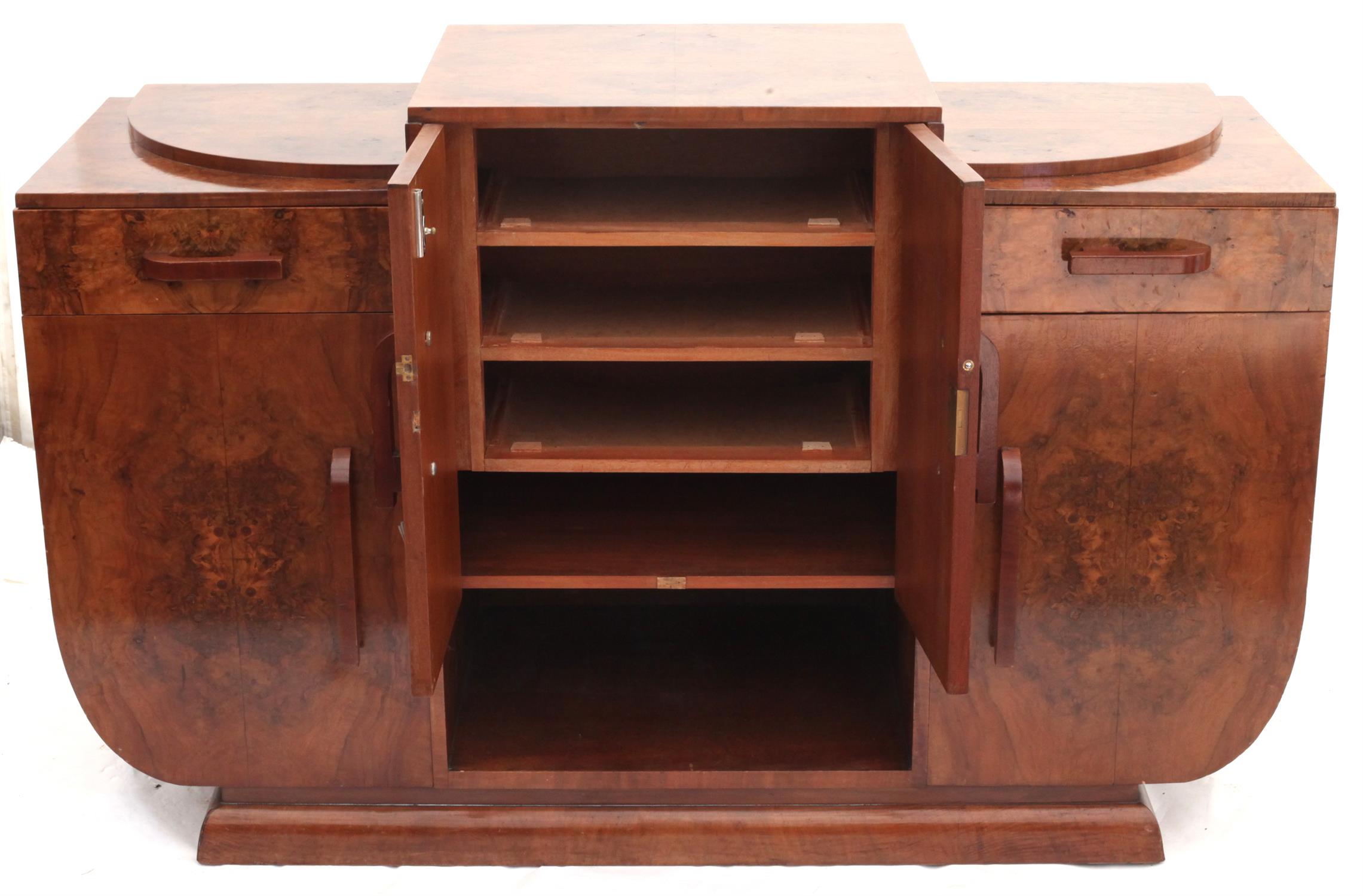 Art Decco burr walnut veneered side board, the central cupboard enclosing three drawers over a - Image 2 of 2