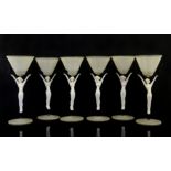 Istvan Komaromy - a set of six glass figural goblets, the stems of a naked female form in white