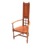 Arts & Crafts style oak open armchair, with high back on turned supports and stretchered base,