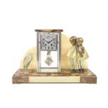 Art Deco mantel clock with a figure of two girls one side and a Marabou bird the other,