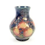 Moorcroft vase, tube lined decorated in Pomegranate and Finches pattern after a design by Sally
