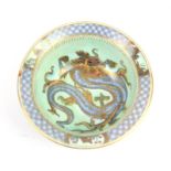 Daisy Makeig-Jones for Wedgwood Dragon lustre bowl with flared rim, decorated with dragons to the
