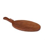 Robert 'Mouseman' Thompson of Kilburn, oval cheeseboard with carved mouse signature to the handle,