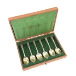 Liberty set of six silver teaspoons, hallmarked, in wooden case lined with green silk which is