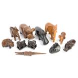 Collection of mostly African carved wooden animals, to include a hippo, h16cm w27cm, elephants,