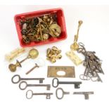 Collection of antique keys and various brass fittings
