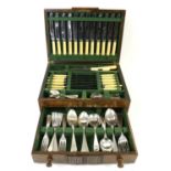 Oak cased canteen of Old English pattern cutlery and other silver plated items to include three