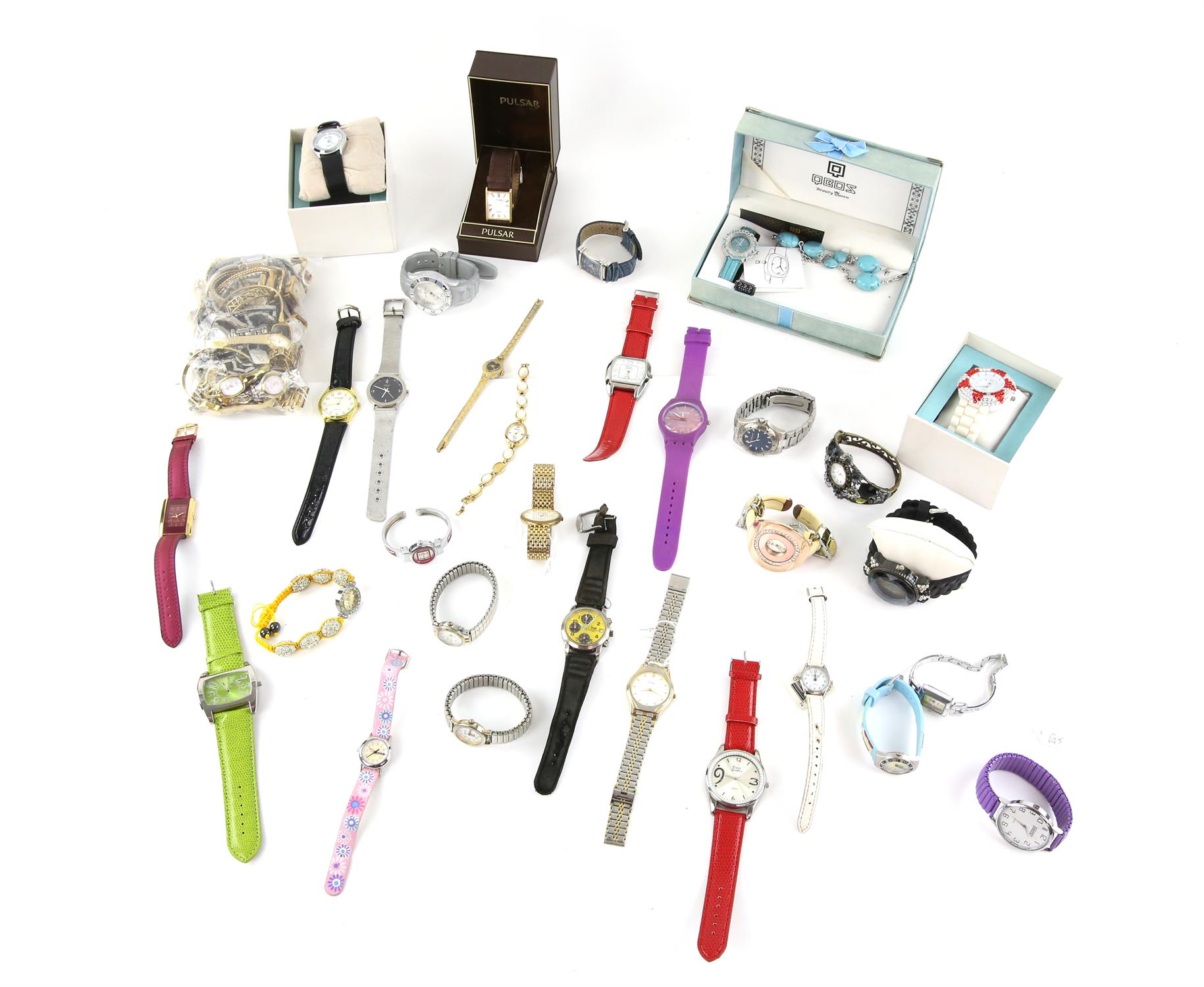 A large quantity of Ladies and gentleman's fashion watches by assorted makers. some with