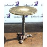 Garden table with circular reconstituted stone top on wrought iron base, h76cm diameter 60cm,