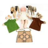 Armand Marseille doll, two Steiff glove puppets, Steiff Alsatian and Zebra and a beaded clutch bag,