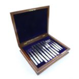Cased set of six mother of pearl handled tea knives and forks