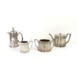 Three piece silver plated tea service, comprising teapot, cream jug and sugar bowl and a