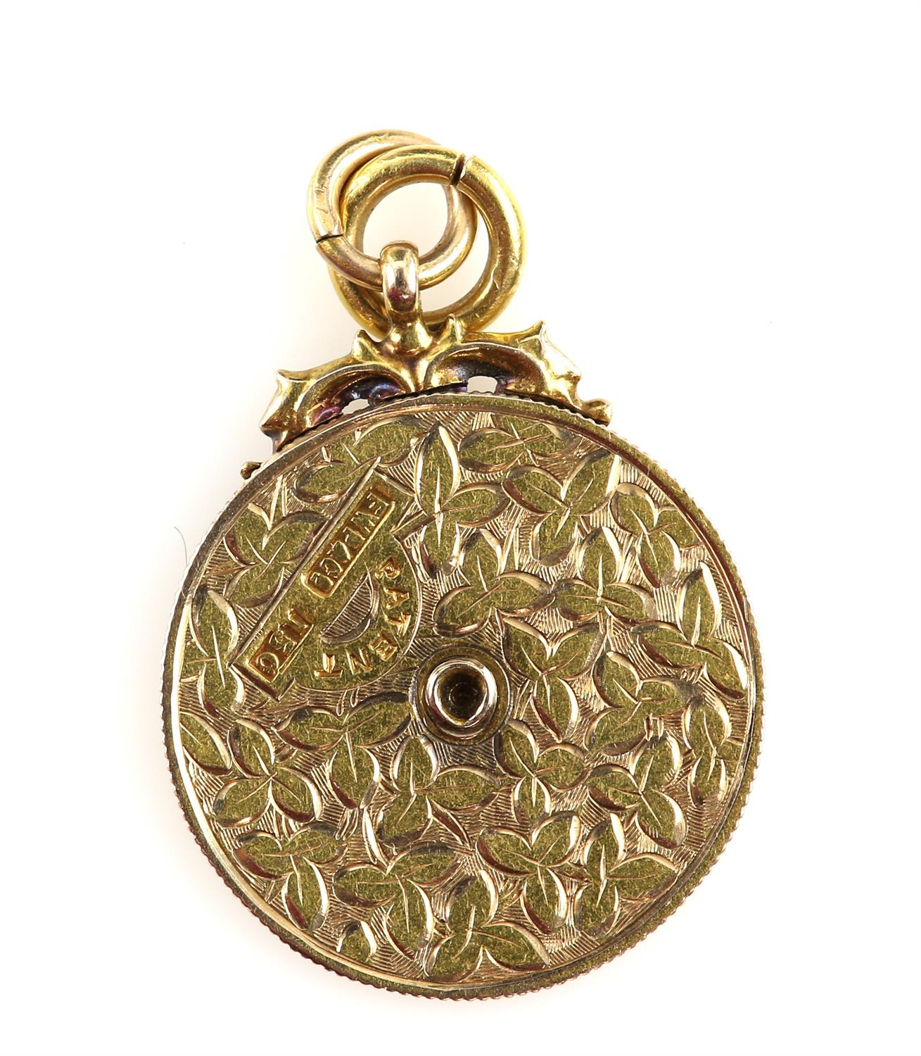 An unusual gold perpetual calendar pendant, ivy leaf engraved decoration, stamped 15 ct gold, - Image 2 of 2