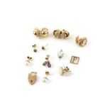 Seven pair of earrings, including cameo earrings, opal earrings, knot earrings, amethyst drops and