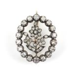 19th C floral diamond brooch, surround set with eighteen old Peruzzi cut diamonds brooch and twenty