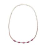 Ruby and diamond necklace, set with fifteen oval cut rubies, estimated total weight 7.55 carats,