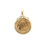 Gold coin mount in 9 ct yellow gold with pendant bail, containing Elizabeth II gold sovereign 2003