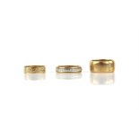 Three gold rings, including a 1950's 9mm band, ring size L, with a bi-coloured band,