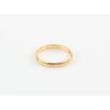 Gold court wedding band, 2.7mm width, stamped 18 ct, ring size N