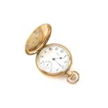Waltham gold plated full hunter pocket watch, round white enamel dial with Arabic numerals and