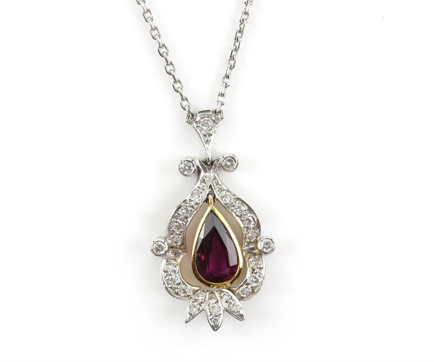 Ruby and diamond pendant, pear cut ruby, weighing an estimated 0.93 carat, suspended at the centre