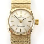 Omega a ladies reference 24175656 gold wristwatch, silvered dial signed Omega Ladymatic,