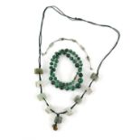 Carved jade elephant bead necklace, together with a jade and silver bead bracelet and a graduated