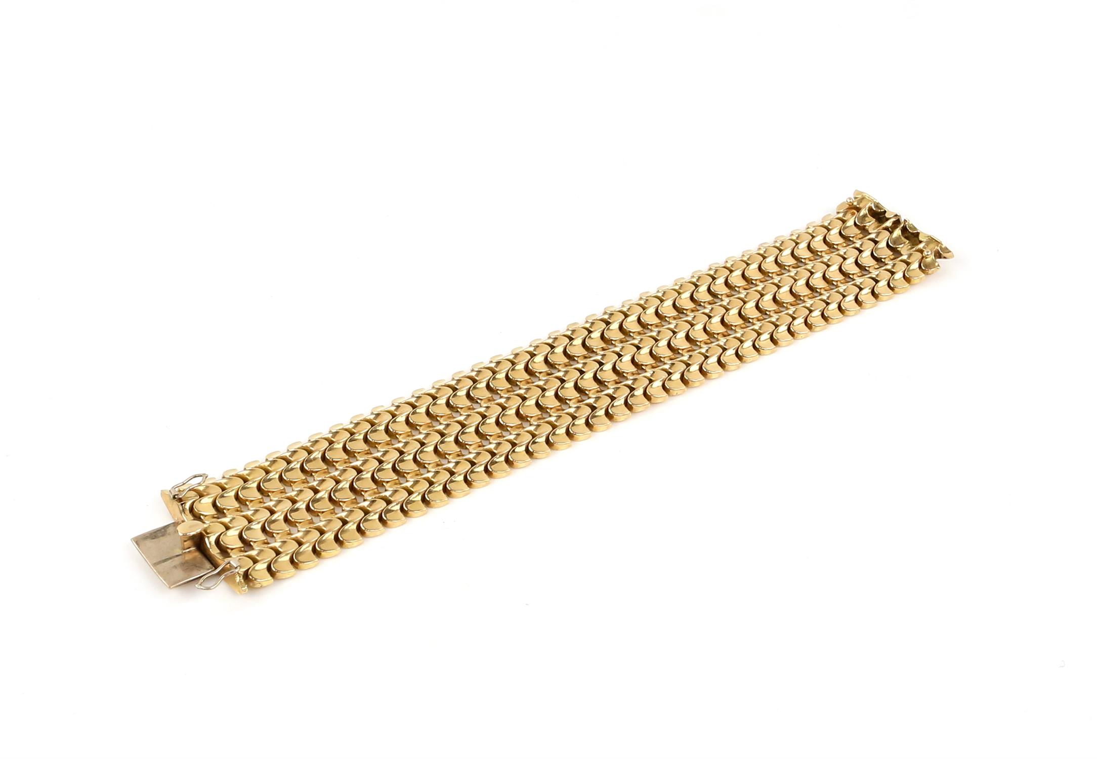 Vintage gold bracelet, three rows of fancy links, 3.5cm in width, with concealed push clasp,