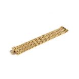 Vintage gold bracelet, three rows of fancy links, 3.5cm in width, with concealed push clasp,