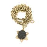 An unusual pendant, designed as the Star of David and set with a Jewish coin dated 42-43 CE; a