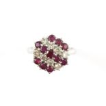 Vintage ruby and diamond cluster ring, set with eight round brilliant cut diamonds,