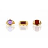 Three signet rings, including a rectangular red paste ring, ring size L, mounted in 18 ct yellow