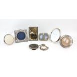 Three silver photo frames and a selection of silver plated frames, variety of dates and styles