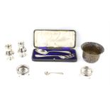 Pair of silver pepperettes, London 1935, pair of cauldron salts, Chester 1900, cased spoon and fork,