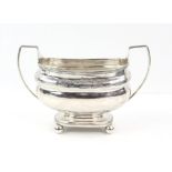 George III two handled sugar bowl with oak leaf band on ball feet, by Ann Robertson Newcastle 1808,